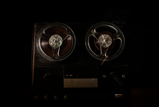 the image of an old reel tape being used as an evp recorder